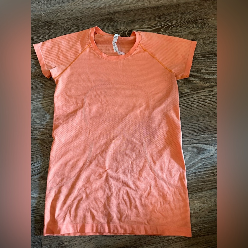 LULULEMON “orange soda” i think short sleeve tee